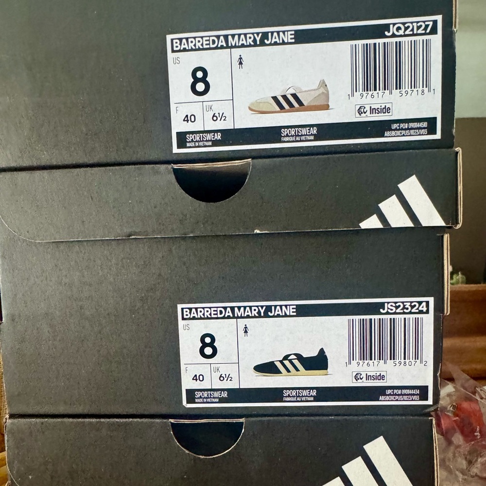 Adidas Barreda Mary Jane Shoes.  One pair dark green, one pair white with black